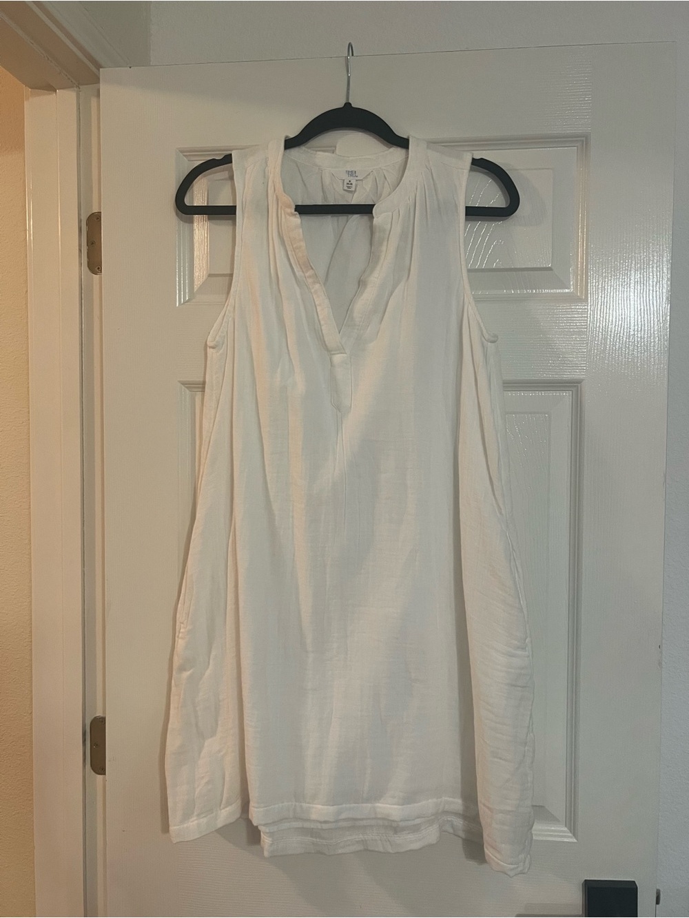 Sleeveless White Split-Neck Tunic